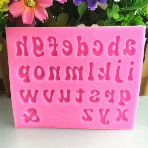Pink silicone lowercase alphabet mold for DIY chocolate and cake decorating