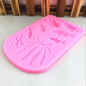 Pink silicone mold featuring tropical sea fish coral and seaweed for DIY fondant cake baking