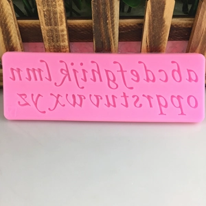 Pink food-grade silicone mold with lowercase a-z alphabet letters for DIY cake baking
