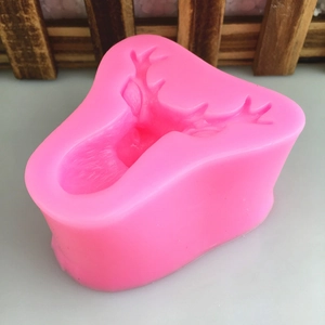 Pink silicone deer head mold for DIY baking, chocolate, resin crafts, and handmade soap making