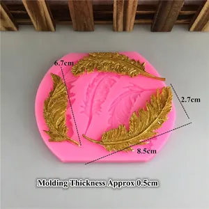 Pink silicone feather mold set for DIY baking and crafts with three size measurements