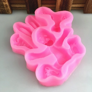 Pink DIY silicone mold for bunny shaped fondant cakes and handmade craft projects