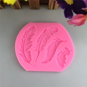 Pink silicone feather mold for fondant cake decorating and clay crafting projects