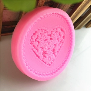 Pink heart-shaped floral silicone mold with bead border for DIY soap and plaster making