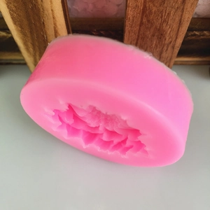 Pink silicone mold featuring a detailed 3D chrysanthemum flower design for DIY baking