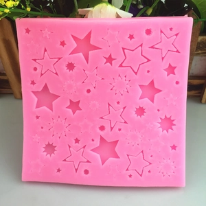Pink silicone star mold for cake decorating and DIY crafts with various star shapes