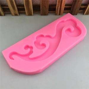 Pink silicone mold with auspicious cloud patterns for fondant and chocolate baking