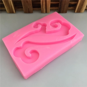 Pink silicone fondant mold with auspicious cloud patterns for DIY cake baking and crafts