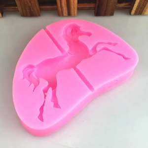 Pink silicone carousel horse mold for DIY cake decorating and fondant chocolate crafts