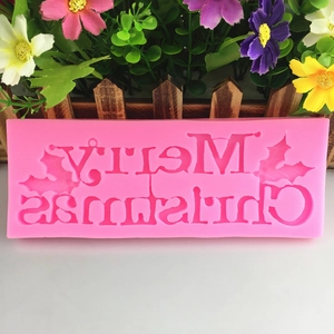 Pink silicone Merry Christmas letter mold with holly leaf patterns for cake baking decor