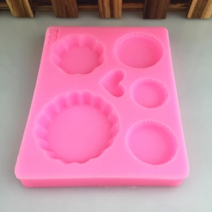 Pink silicone waffle and heart shaped mold for DIY baking and handmade crafts