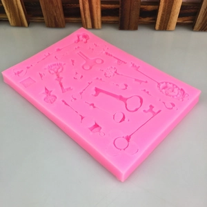 Moule en silicone rose style steampunk avec motifs de clés vintage pour fondant et chocolat