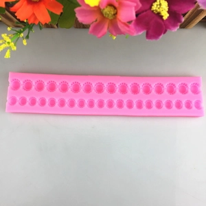 Pink silicone pearl chain mold for fondant cake decorating and DIY baking projects
