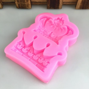 Pink silicone crown mold for DIY cake decorating fondant and chocolate craft projects