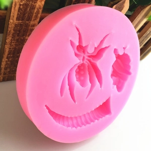 Pink silicone mold with insect and bee shapes for cake baking and soap crafting