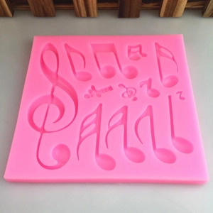 Moule en silicone rose avec notes de musique pour décoration de gâteaux et chocolats DIY