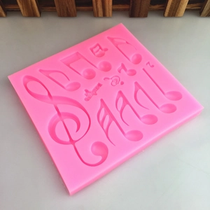 Moule en silicone rose pour pâtisserie DIY avec notes de musique et clé de sol