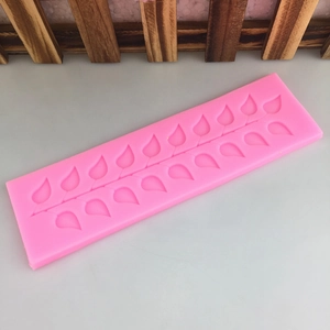 Pink silicone leaf mold for DIY fondant cake lace decoration and kitchen crafting