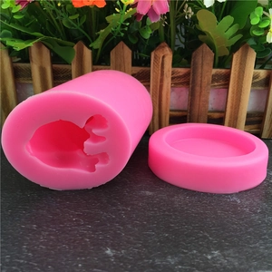 Macro detail of a pink silicone French Bulldog mold and round base for DIY crafts