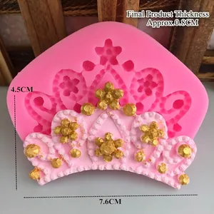 Pink silicone crown mold for DIY cake decoration and fondant crafts with floral details