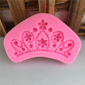 Bright pink crown shaped silicone mold for fondant cake decorating and DIY crafts