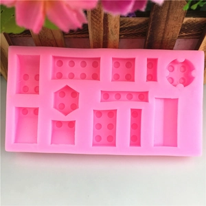 Pink silicone block mold with 10 cavities for DIY baking and building brick shapes