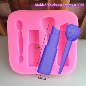 Light pink silicone mold for DIY lipstick and makeup brush shapes with blue resin sample