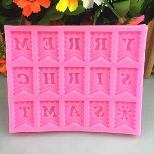 Pink silicone Merry Christmas banner cake mold with 15 flag-shaped alphabet cavities