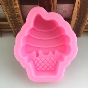 Pink silicone mold in cupcake ice cream shape for mousse cake and chocolate making