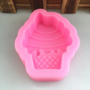 Pink cupcake shaped silicone mold for mousse dessert and chocolate making with grid texture
