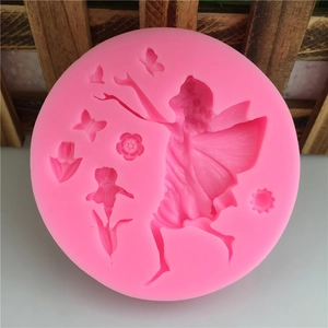 Pink silicone mold featuring an angel girl with butterfly and flower relief for DIY cakes