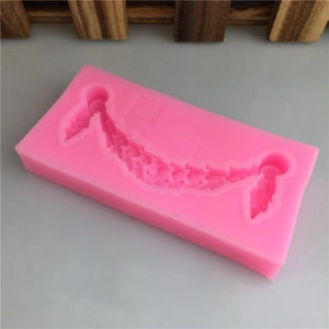 Moule en silicone rose pour décors de guirlandes pour gâteaux en chocolat et fondant