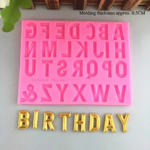 Pink silicone alphabet mold with 26 letters and symbols for DIY chocolate fondant crafts