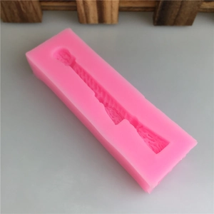 Pink flexible silicone fondant mold with tassel fringe design for DIY cake decorating