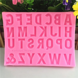 Pink silicone mold featuring 26 uppercase letters for fondant or chocolate DIY baking craft