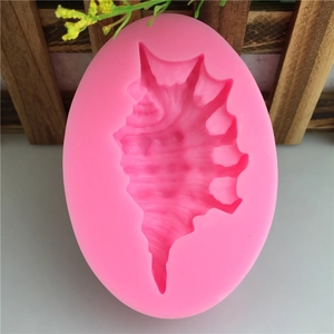 Pink silicone conch sea shell mold for DIY fondant cake and chocolate baking projects