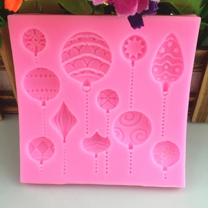 Rosa Silikonform für Weihnachtskugeln mit Stern- und Wellenmustern für DIY Backen geeignet