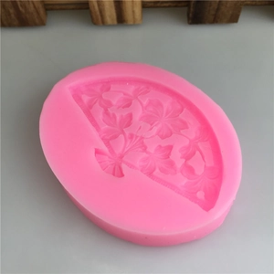 Pink silicone mold with traditional Chinese fan pattern and floral maple leaf details