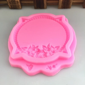 Macro detail of a pink silicone flower wreath mold for fondant and DIY resin crafts