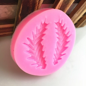 Pink silicone leaf pattern fondant mold for DIY baking and cake decorating crafts