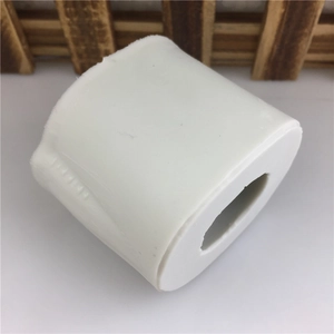 Detail view of a white silicone 3D duck cake mold showing the hollow oval texture and material