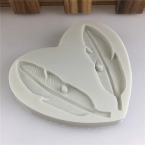 White heart-shaped silicone feather mold for cake decorating and DIY resin crafts