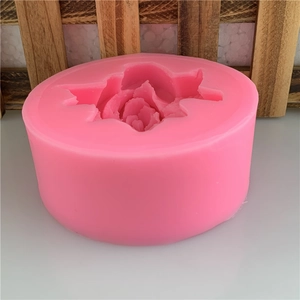 Pink silicone mold featuring large 3D rose patterns for DIY soap and candle making