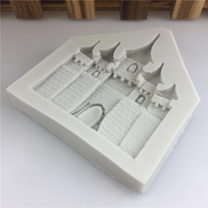 DIY gray silicone mold with detailed castle relief for fondant cakes or soap making