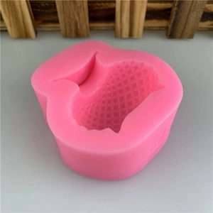 Pink silicone vase mold for DIY cake decorating with detailed geometric mesh texture