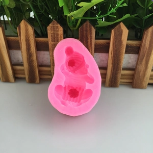 Pink silicone baby mold for chocolate fondant cake and handmade soap crafting