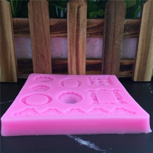 Pink silicone mold featuring vintage photo frame and lace patterns for fondant cake decoration