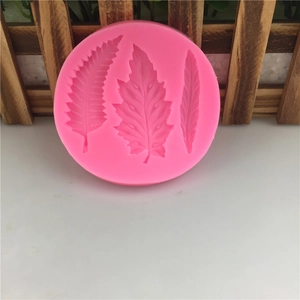 Pink silicone leaf mold for fondant cake decorating and DIY chocolate leaf shaping