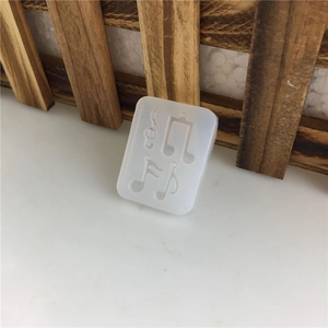 Translucent silicone mold with music note shapes for resin and chocolate DIY crafts