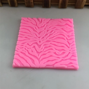 Pink silicone fondant mold with zebra pattern texture for DIY cake decorating